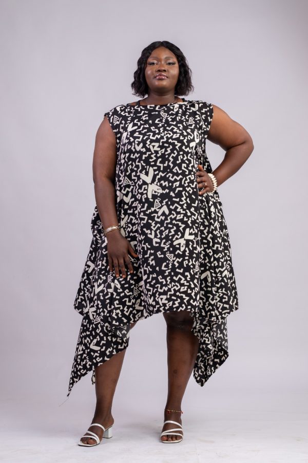 Robe fluide asymétrique en tissus taille 42-44 se porte ample